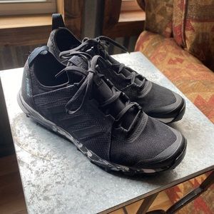 Black Adidas tennis shoes. Terrex